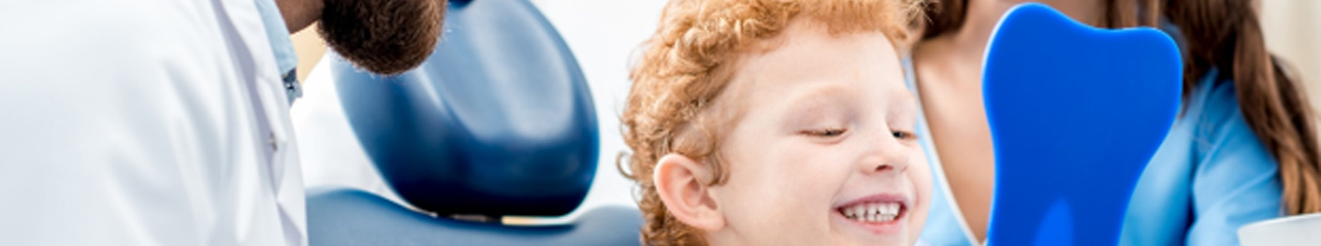 Boy smiling at the dentist