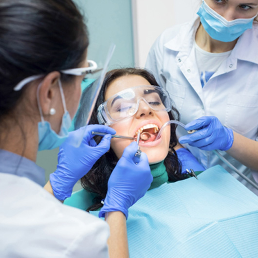 Woman getting a dental treatment