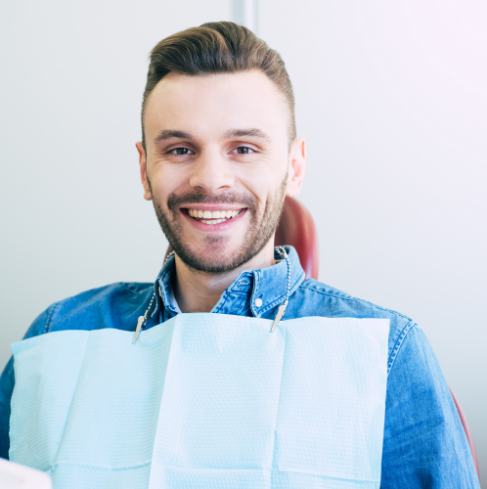 Man smiling in dental chair