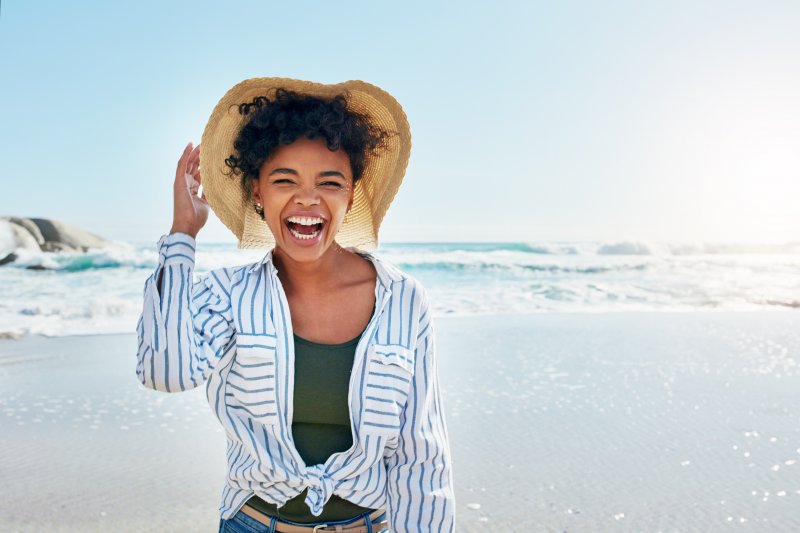 woman smiling on the beach