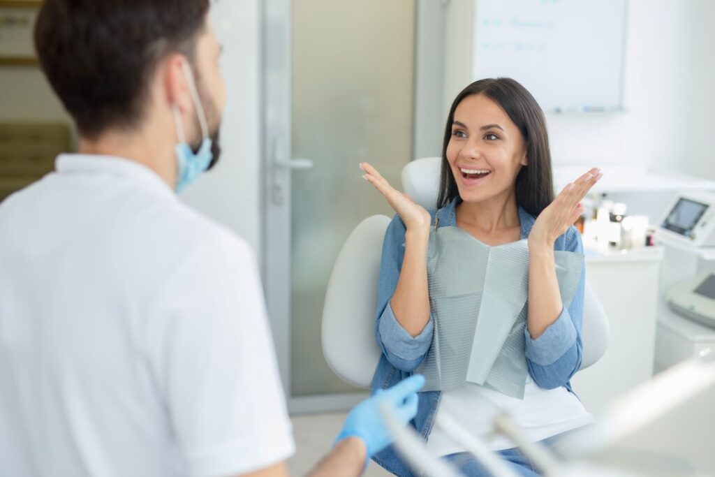 A woman talking to her dentist